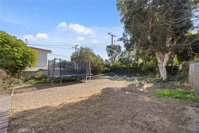 view of yard featuring a trampoline