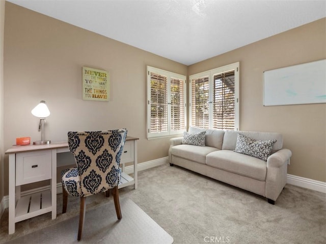 office space with light colored carpet