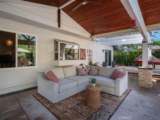 view of patio featuring ceiling fan and an outdoor hangout area