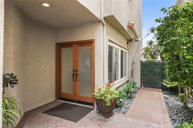 doorway to property featuring french doors