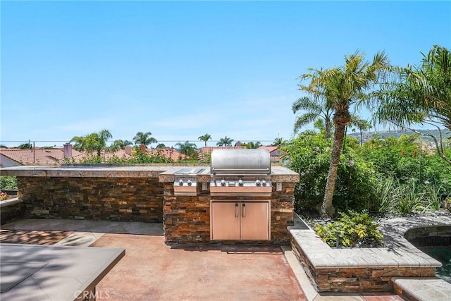 view of patio featuring a grill and area for grilling