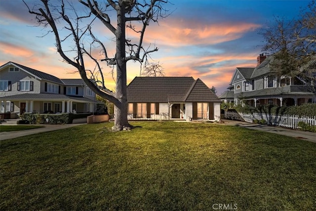 view of front of house with a lawn