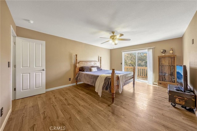 bedroom with ceiling fan, access to exterior, and light hardwood / wood-style floors