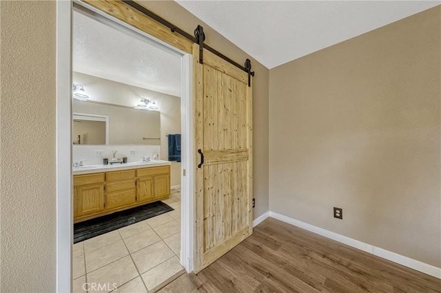 bathroom with hardwood / wood-style flooring and vanity