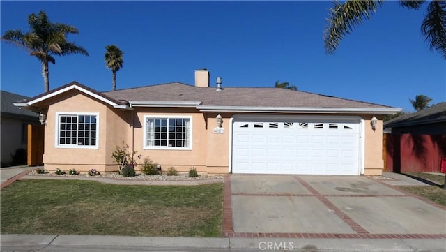 single story home featuring a front lawn, concrete driveway, stucco siding, a chimney, and an attached garage