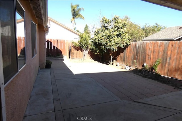 view of patio with a fenced backyard