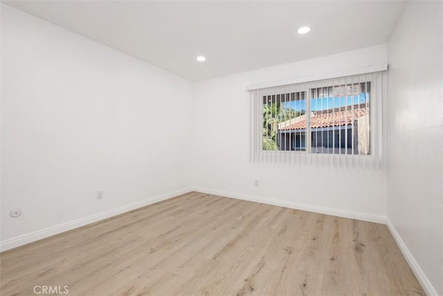 unfurnished room featuring light wood-type flooring