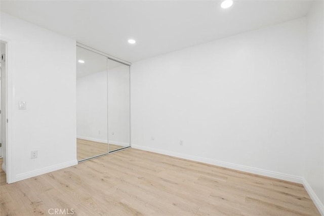 empty room featuring light hardwood / wood-style floors