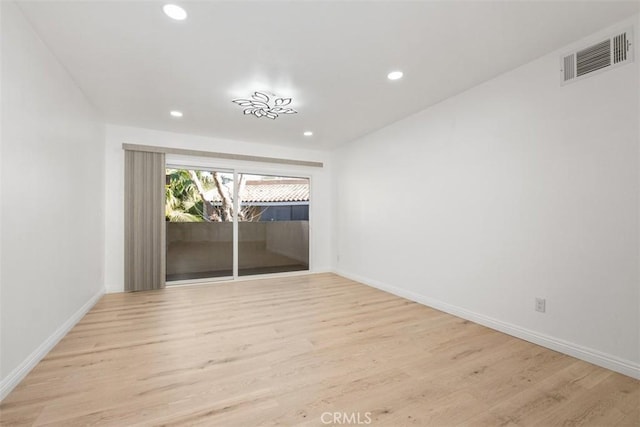 empty room featuring light hardwood / wood-style flooring