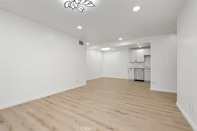 unfurnished living room with light hardwood / wood-style floors