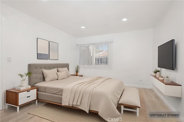 bedroom featuring light hardwood / wood-style flooring