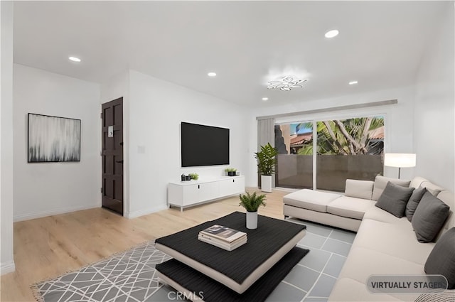 living room with light hardwood / wood-style flooring