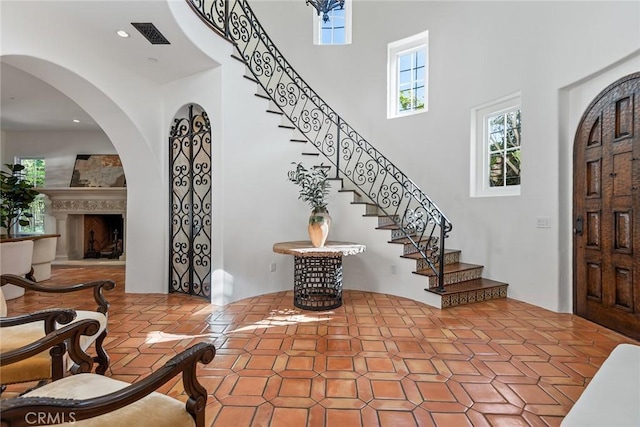 entrance foyer with a towering ceiling