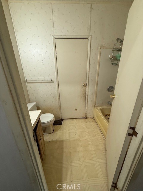 full bathroom with vanity, toilet, and shower / bathing tub combination