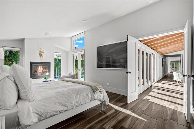 bedroom with french doors and lofted ceiling