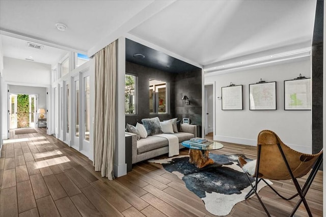 living area with dark hardwood / wood-style floors