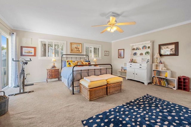 carpeted bedroom featuring ornamental molding and ceiling fan