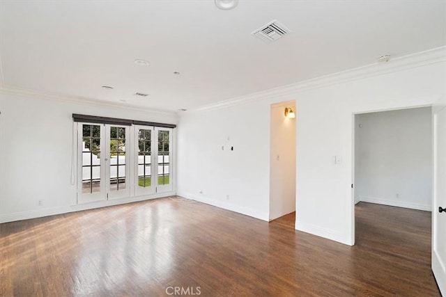 unfurnished room featuring crown molding and dark hardwood / wood-style flooring