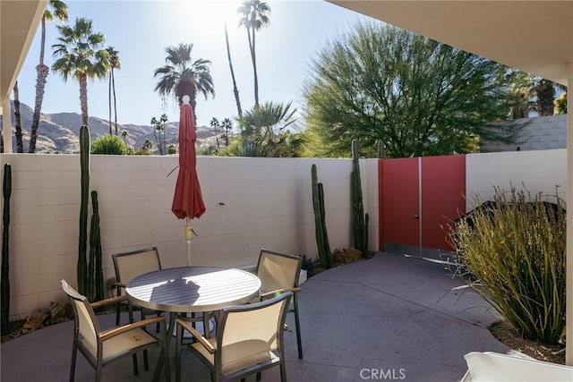 view of patio with a mountain view