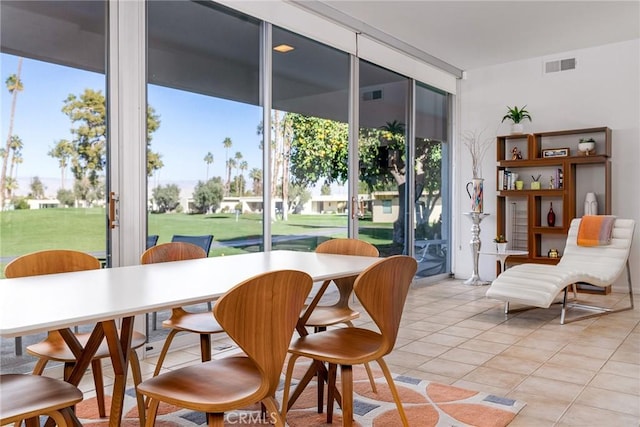 dining room featuring light tile patterned flooring