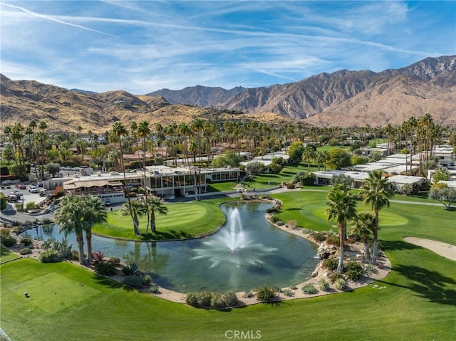 surrounding community featuring a water and mountain view