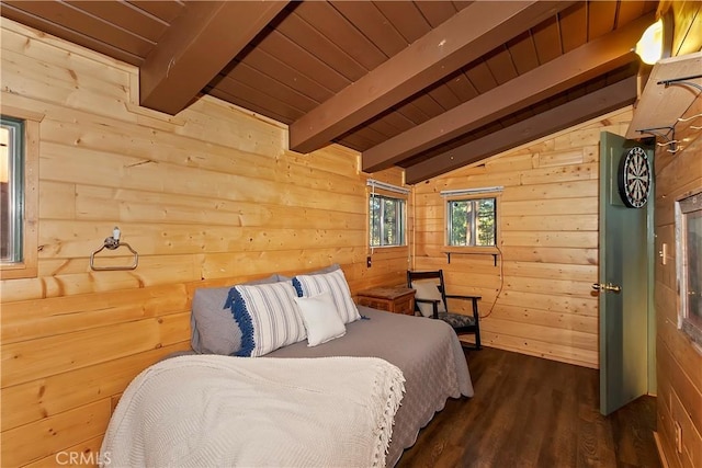 bedroom featuring vaulted ceiling with beams, dark wood-type flooring, and wooden ceiling