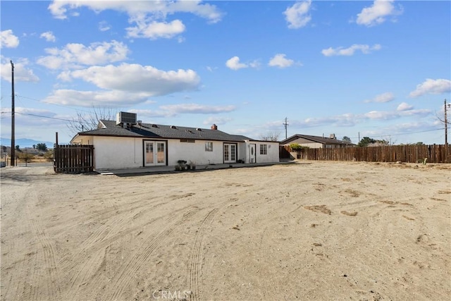 back of property with central air condition unit