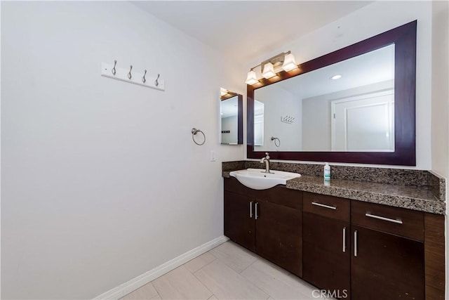 bathroom featuring tile patterned floors and vanity