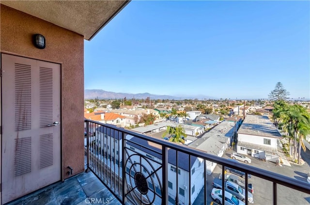 balcony featuring a mountain view