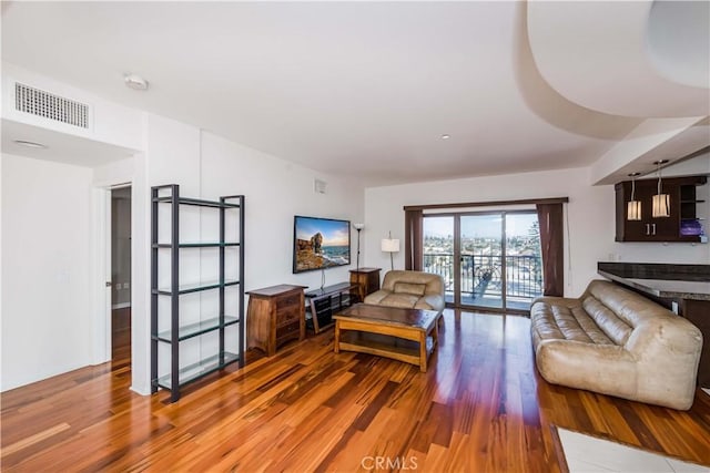 living room with hardwood / wood-style floors