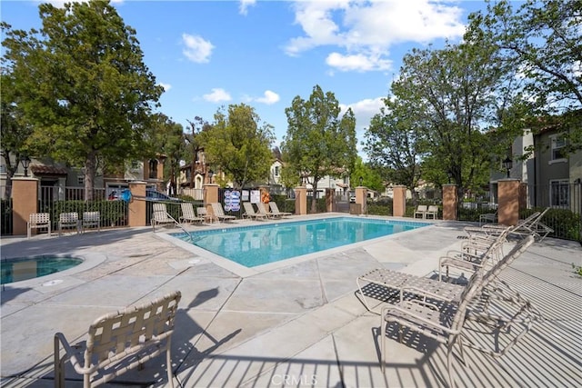 view of pool featuring a patio area