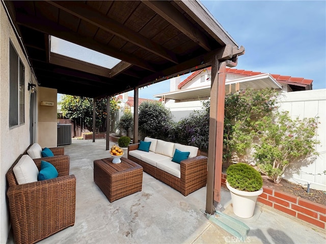 view of patio with an outdoor living space and central AC unit