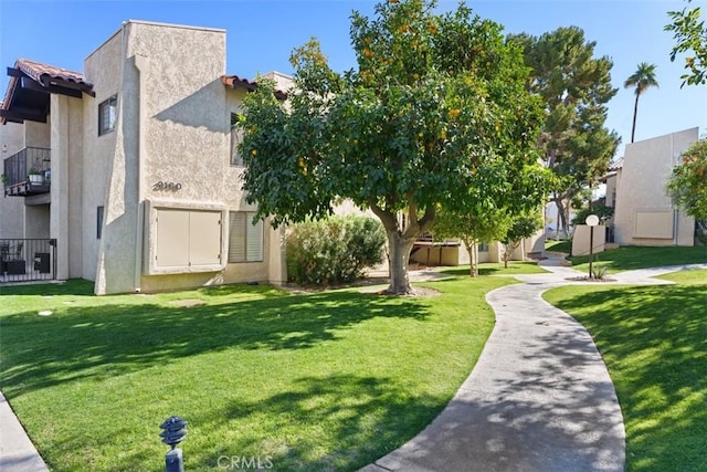 view of community featuring a lawn