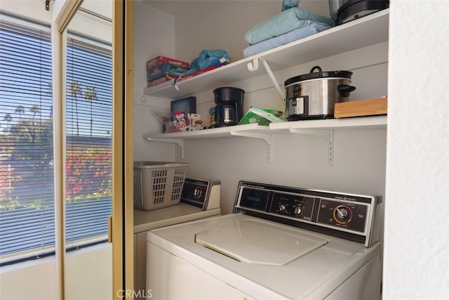 laundry room featuring separate washer and dryer