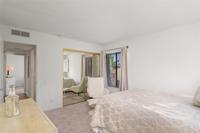 bedroom featuring carpet floors and a closet