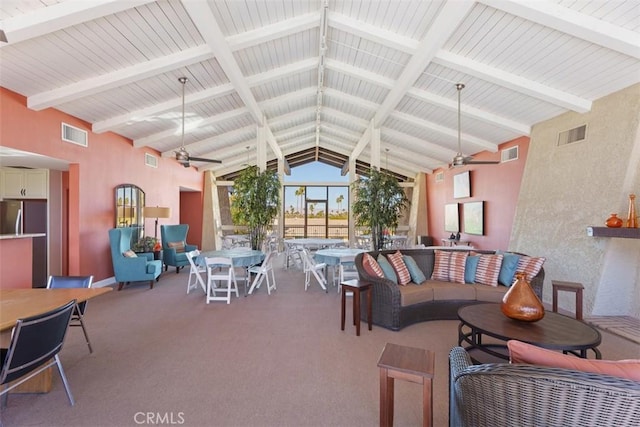 interior space featuring lofted ceiling with beams