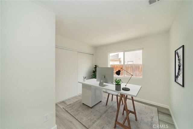 office featuring light hardwood / wood-style flooring