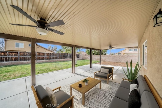 view of patio / terrace featuring an outdoor living space and ceiling fan