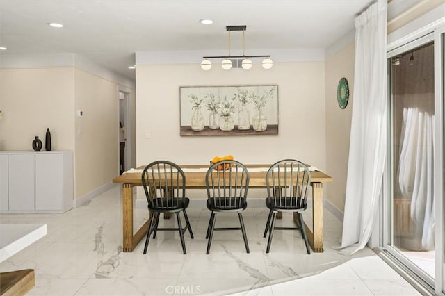 dining space with breakfast area, recessed lighting, marble finish floor, and baseboards