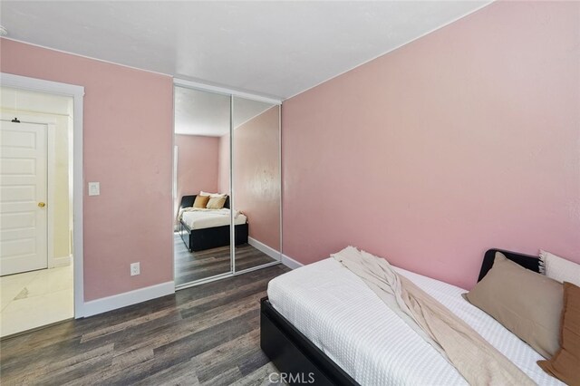 23726 La Salle Canyon Rd, Newhall, CA 91321 - bedroom with a closet and wood finished floors