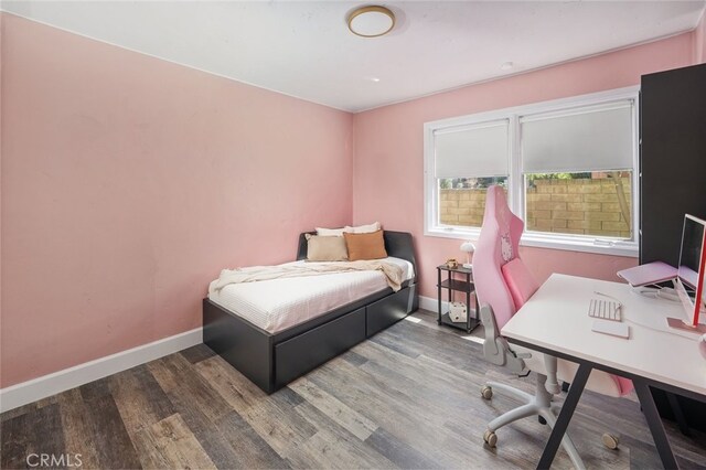 23726 La Salle Canyon Rd, Newhall, CA 91321 - bedroom with wood finished floors and an office area