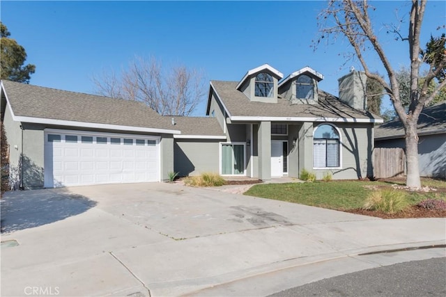 view of front of property with a garage