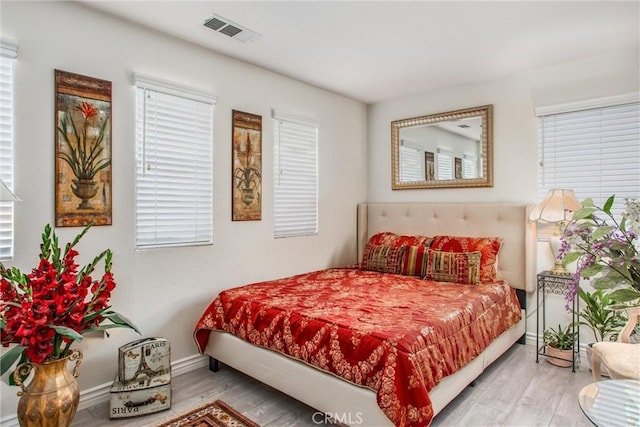 bedroom featuring wood-type flooring