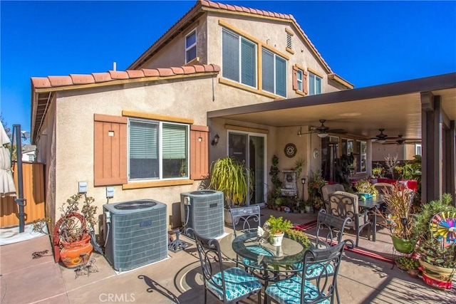 back of house with ceiling fan, a patio area, and central air condition unit