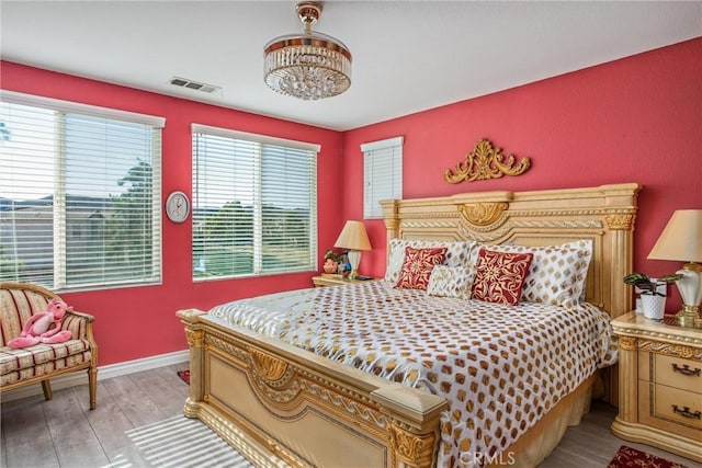 bedroom featuring light hardwood / wood-style floors