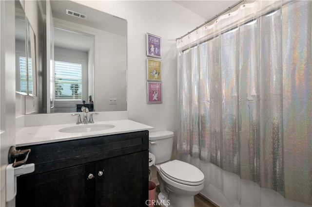 full bathroom featuring vanity, toilet, and shower / bathtub combination with curtain