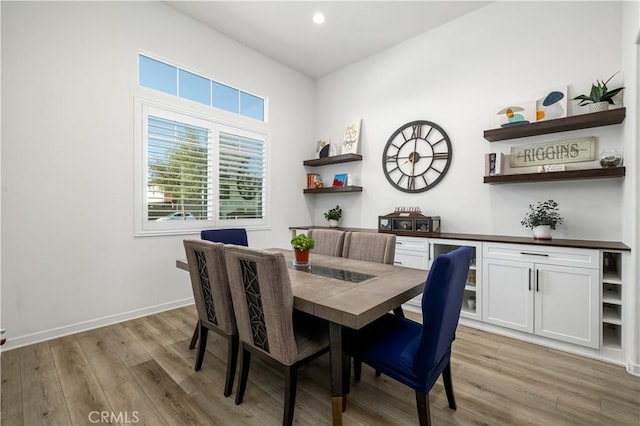 dining area featuring light hardwood / wood-style flooring