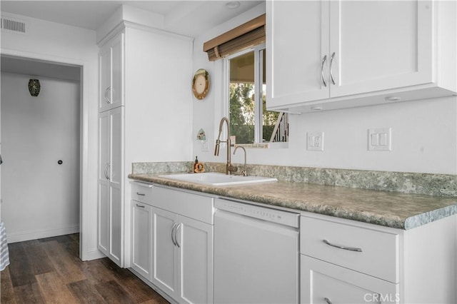 kitchen featuring white dishwasher, dark hardwood / wood-style flooring, sink, and white cabinets