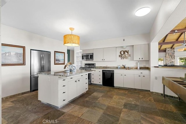 kitchen featuring sink, appliances with stainless steel finishes, white cabinetry, hanging light fixtures, and a center island