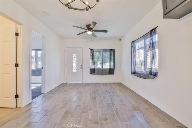 entryway with ceiling fan